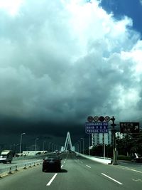 View of cars moving on road