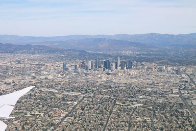 Aerial view of landscape against sky during winter