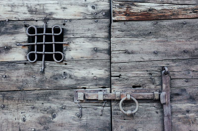 Close-up of padlock on door