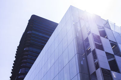 Low angle view of skyscraper against clear sky