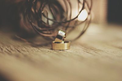 Close-up of engagement rings on table