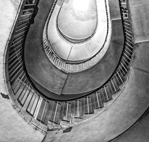 Directly below shot of spiral staircase in building