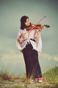 Woman standing on a field