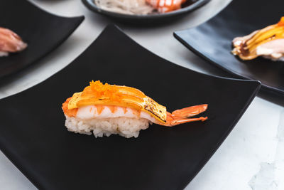 High angle view of sushi in plate on table