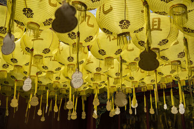 Low angle view of decorations hanging for sale