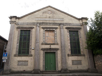 Exterior of historic building against sky