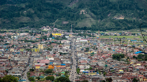 High angle view of townscape and trees in city