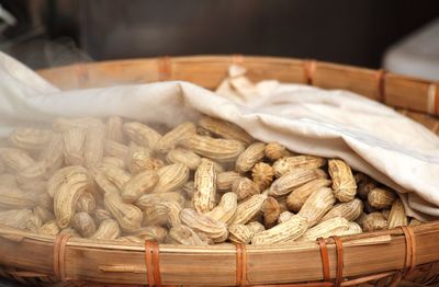 High angle view of boiled peanuts in wicker basket
