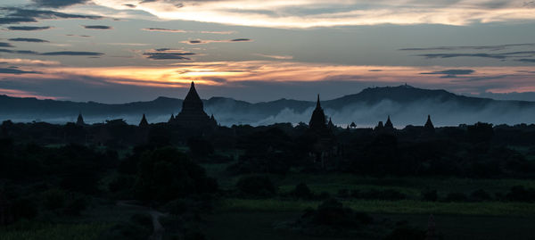Scenic view of landscape against sky during sunset