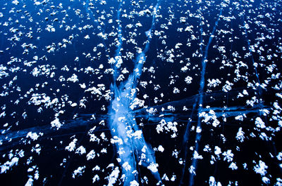 Close-up of water splashing against black background