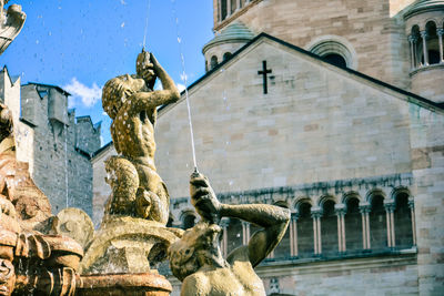 Low angle view of statue of historic building