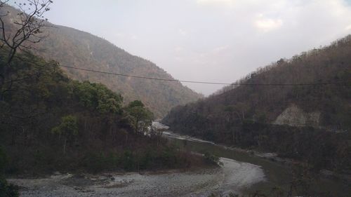 Scenic view of river against sky