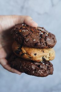 Close-up of hand holding cookies