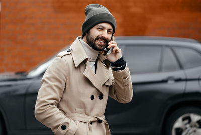 Young man talking on mobile phone