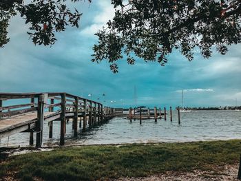 Pier over sea against sky