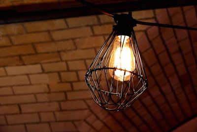 Close-up of illuminated light bulb