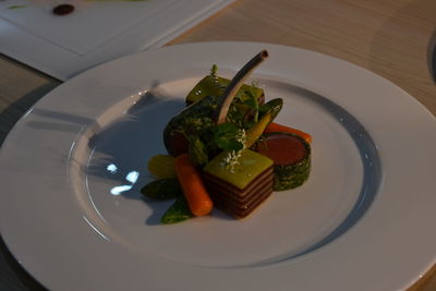 High angle view of vegetables served in plate on table