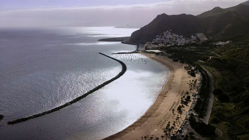 High angle view of bay against sky