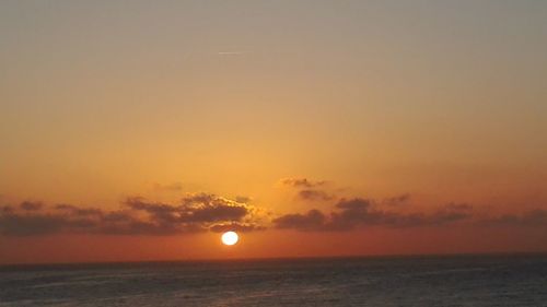 Dramatic sky over sea during sunset