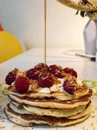 Close-up of cake served on table