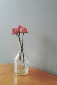 Close-up of flower vase on table