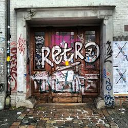 Graffiti on brick wall