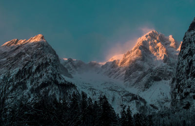 Scenic view of snowcapped mountains against sky