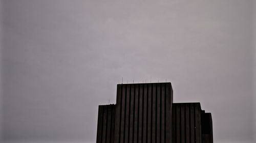 Low angle view of modern building against sky