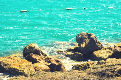 Scenic view of rocks in sea