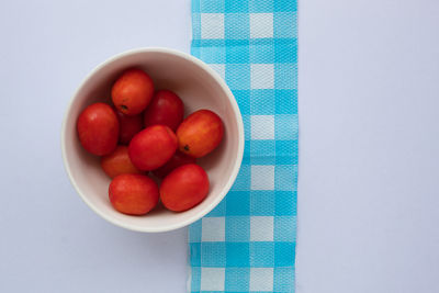 High angle view of fruits in bowl on table