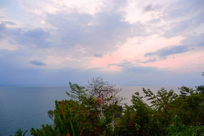 Scenic view of sea against sky at sunset