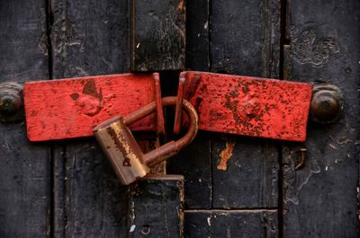 Close-up of old rusty metal gate