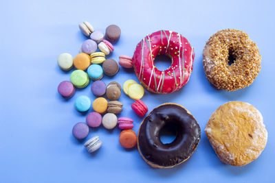 High angle view of multi colored candies on table