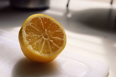 Close-up of lemon on table