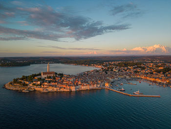 Sunset aerial panorama of old town rovinj, famous ancient croatian city at the sea. istria, croatia.