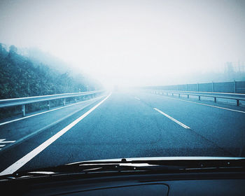 Road passing through fog