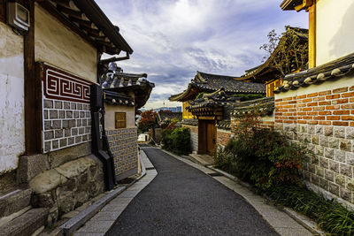 Alley amidst buildings in city