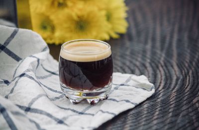 Close-up of coffee cup on table