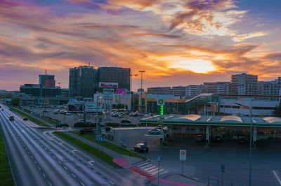 High angle view of buildings against sky during sunset