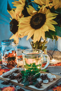 Close-up of sunflowers in vase on table