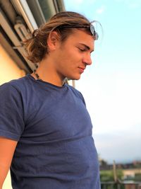 Portrait of young man looking away