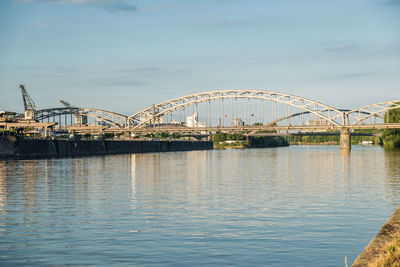 View of bridge over river against sky