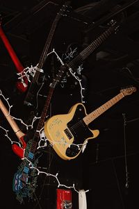 Illuminated guitar at night