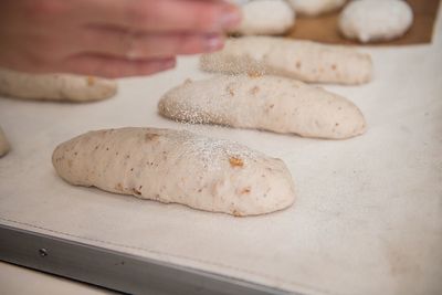 Close-up of cropped hand holding food