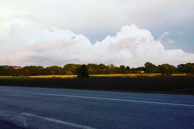 Road passing through field