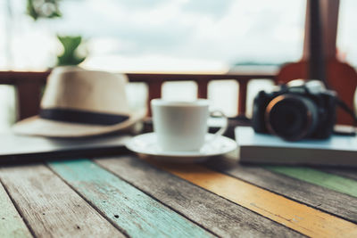 Close-up of coffee cup on table