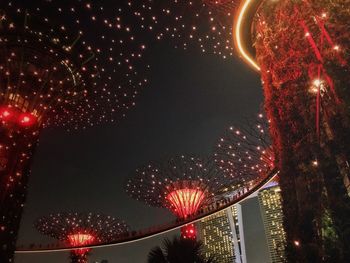 Low angle view of illuminated building at night