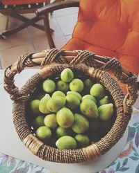 High angle view of figs in basket on table