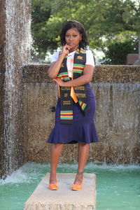 Black grad  graduating with her bachelors from a prestigious university 