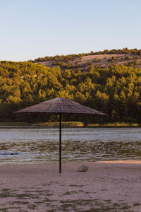 Scenic view of beach against clear sky